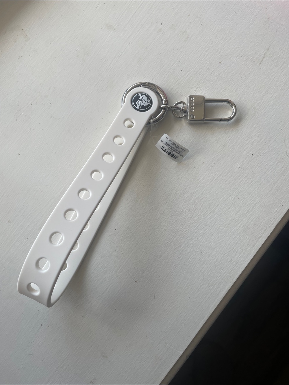 CROCS White Jibbitz Strap Keychain with Silver Hardware